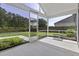 Screened-in patio with views of the backyard and wooded area, perfect for relaxing at 1245 Hammrick Ln, Johns Island, SC 29455