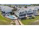 Aerial view of beach home with a private pool, boardwalk, and ocean view at 126 W 2Nd St, Folly Beach, SC 29439