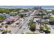 Aerial view showcases a bustling coastal town with shops, restaurants, and lively street scenes at 126 W 2Nd St, Folly Beach, SC 29439