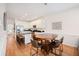 Open-concept kitchen and dining area with modern appliances and seating at 126 W 2Nd St, Folly Beach, SC 29439