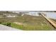 Panoramic view of the marsh, featuring lush vegetation, docks, and waterways, offering a serene natural landscape at 126 W 2Nd St, Folly Beach, SC 29439