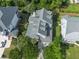 Aerial view showcases a well-maintained home with a neatly landscaped yard at 133 Wando Reach Rd, Wando, SC 29492
