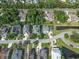 Aerial perspective of a home with lush surroundings, situated on a peaceful street at 133 Wando Reach Rd, Wando, SC 29492