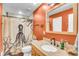 Unique bathroom featuring a single sink vanity, decorative mirror, and a shower with an octopus curtain at 1534 Salisbury St, Charleston, SC 29407