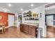 Kitchen area featuring ample cabinet space, granite counters, and wood flooring at 1534 Salisbury St, Charleston, SC 29407
