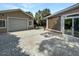 Backyard featuring a detached garage and a pool with a relaxing outdoor patio at 16 Charlyn Dr, Charleston, SC 29407