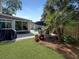 Charming backyard featuring a brick patio, refreshing pool, and outdoor furniture at 16 Charlyn Dr, Charleston, SC 29407
