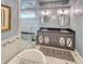 Bathroom with double sinks, granite countertop and a large glass enclosed shower at 16 Charlyn Dr, Charleston, SC 29407