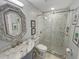 Bathroom with a vanity and marble countertop and a large, marble tiled shower at 16 Charlyn Dr, Charleston, SC 29407