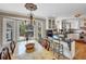 Charming dining area next to kitchen with bright natural light at 16 Charlyn Dr, Charleston, SC 29407