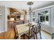 Elegant dining room with backyard view and access to living room at 16 Charlyn Dr, Charleston, SC 29407