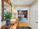 Foyer featuring a hardwood floor and a view into the dining room with blue walls at 16 Charlyn Dr, Charleston, SC 29407