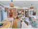 Bright sunroom with hardwood floors, comfortable seating, and plenty of natural light at 16 Charlyn Dr, Charleston, SC 29407