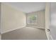Bright bedroom with neutral walls, plush carpet, and a window offering natural light at 1781 Tennyson # 6, Mount Pleasant, SC 29466