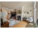 Comfortable living room with a fireplace, hardwood floors, and staircase at 1781 Tennyson # 6, Mount Pleasant, SC 29466