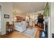 Inviting living room that flows into a kitchen with wood floors and a neutral color palette at 1781 Tennyson # 6, Mount Pleasant, SC 29466