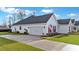 Charming single-Gathering home with white siding, a gray roof, and a well-manicured lawn at 179 Darby Meadow Ln, Ridgeville, SC 29472