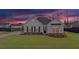 Charming single-Gathering home with a manicured lawn, classic white siding, and a welcoming front entrance at 179 Darby Meadow Ln, Ridgeville, SC 29472