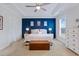 Beautiful main bedroom with trey ceilings, blue accent wall and carpet flooring at 179 Darby Meadow Ln, Ridgeville, SC 29472