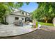 Extensive backyard features a large patio, outdoor seating, play equipment, and lush landscaping for year-round fun at 1872 Rifle Range Rd, Mount Pleasant, SC 29464