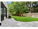 Expansive backyard with lush green lawn, playground, and patio area perfect for outdoor enjoyment at 1872 Rifle Range Rd, Mount Pleasant, SC 29464