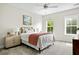 Inviting bedroom with soft carpet, a comfy bed, and natural light at 1872 Rifle Range Rd, Mount Pleasant, SC 29464