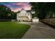 Beautiful home featuring classic design elements under a stunning twilight sky at 1872 Rifle Range Rd, Mount Pleasant, SC 29464