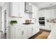 Well-appointed kitchen with sleek cabinetry, stainless steel appliances, and a functional layout, designed for modern living at 1872 Rifle Range Rd, Mount Pleasant, SC 29464