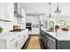 Bright and airy kitchen featuring subway tile backsplash, quartz countertops, and high-end appliances for a chef-inspired space at 1872 Rifle Range Rd, Mount Pleasant, SC 29464