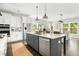 Spacious kitchen with a central island, stainless steel appliances, and an open layout, ideal for entertaining guests at 1872 Rifle Range Rd, Mount Pleasant, SC 29464