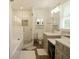 Luxurious bathroom with a glass shower, double vanity, and ample storage space, offering a spa-like experience at 201 Welles Ln, Walterboro, SC 29488