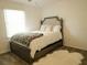 Bedroom featuring a bed with carpet flooring, and a faux fur rug at 201 Welles Ln, Walterboro, SC 29488
