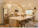 Gourmet kitchen with stainless steel appliances, a large island, and modern cabinetry, perfect for culinary enthusiasts at 201 Welles Ln, Walterboro, SC 29488