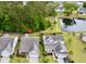 Aerial view of the home highlighting its location near a pond and surrounded by lush greenery at 2022 Elvington Rd, Johns Island, SC 29455