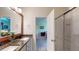 Beautiful bathroom featuring granite counters, dual sinks, and a glass-enclosed shower at 2022 Elvington Rd, Johns Island, SC 29455