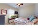 Charming bedroom with a ceiling fan, TV, and natural light from a window at 2022 Elvington Rd, Johns Island, SC 29455