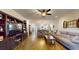 Spacious living room with hardwood floors, a ceiling fan, and an open floor plan at 2022 Elvington Rd, Johns Island, SC 29455