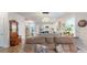 Open concept living room that leads to the kitchen and dining area at 2022 Elvington Rd, Johns Island, SC 29455