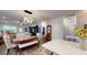 Open-concept living space featuring a kitchen with an island, dining area and living room at 2022 Elvington Rd, Johns Island, SC 29455