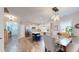 Open-concept living space featuring a kitchen with an island, dining area and stainless appliances at 2022 Elvington Rd, Johns Island, SC 29455