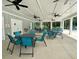Covered poolside lounge area with ample seating, providing a comfortable space for socializing and relaxing by the pool at 2022 Elvington Rd, Johns Island, SC 29455