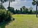 Community baseball field surrounded by lush greenery, perfect for outdoor recreation and community events at 2050 Wappoo Hall Rd, Charleston, SC 29412