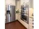 Gourmet kitchen featuring stainless steel refrigerator and double oven at 2050 Wappoo Hall Rd, Charleston, SC 29412