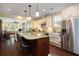 Open concept kitchen with a large island and stainless steel appliances at 2050 Wappoo Hall Rd, Charleston, SC 29412