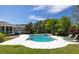 Backyard pool and patio with outdoor seating and lush landscaping near the back of the house at 2050 Wappoo Hall Rd, Charleston, SC 29412