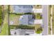 Aerial view of the home's backyard showcasing a green lawn and privacy fencing at 209 Palmetto Walk Dr, Summerville, SC 29486