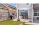 Patio with a grill, outdoor dining set, and a view of the fenced backyard at 209 Palmetto Walk Dr, Summerville, SC 29486