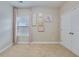 Neutral bedroom with tan carpet, pastel pink curtains, and assorted gold-framed wall art decor at 209 Palmetto Walk Dr, Summerville, SC 29486