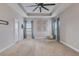 Spacious bedroom featuring trey ceiling, ceiling fan, carpeted floors, and natural light at 209 Palmetto Walk Dr, Summerville, SC 29486