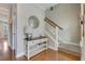 Foyer with a wooden floor and staircase leading to the upper level at 209 Palmetto Walk Dr, Summerville, SC 29486